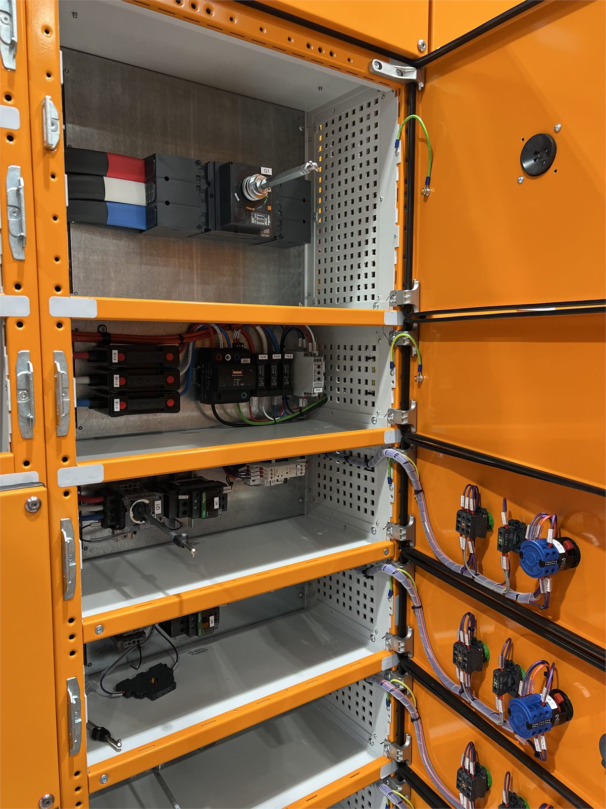 Open motor control centre showing internal compartments