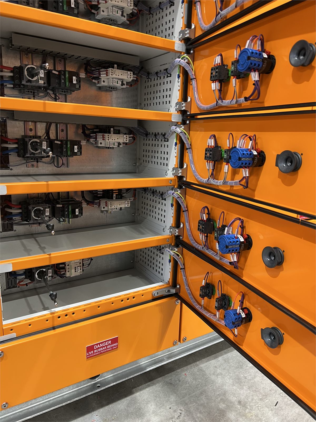 Internal wiring and door-mounted controls in a motor control centre